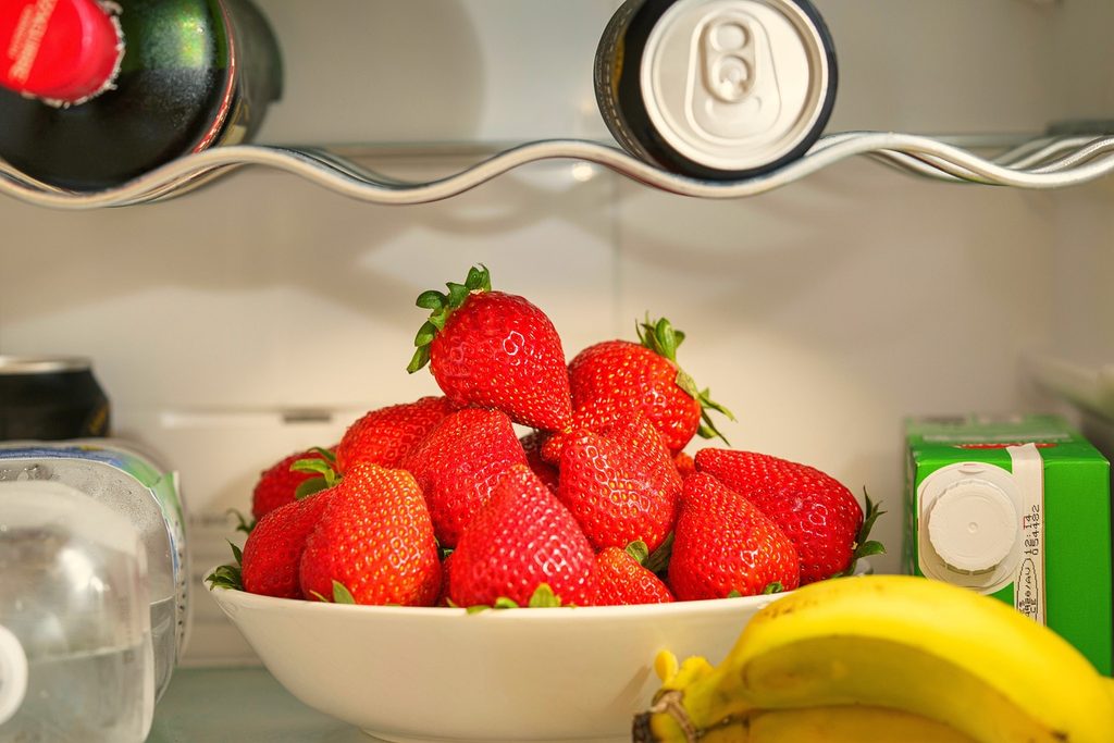 Fruits on shelf in fridge