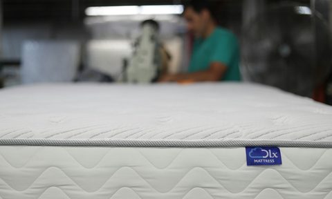 Bare mattress close up.