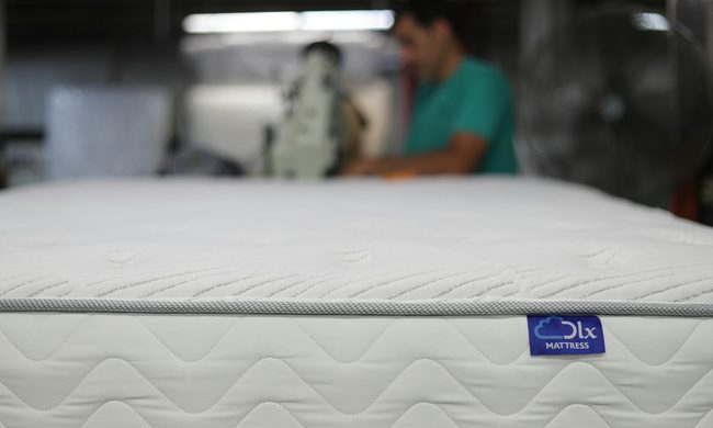 Bare mattress close up.