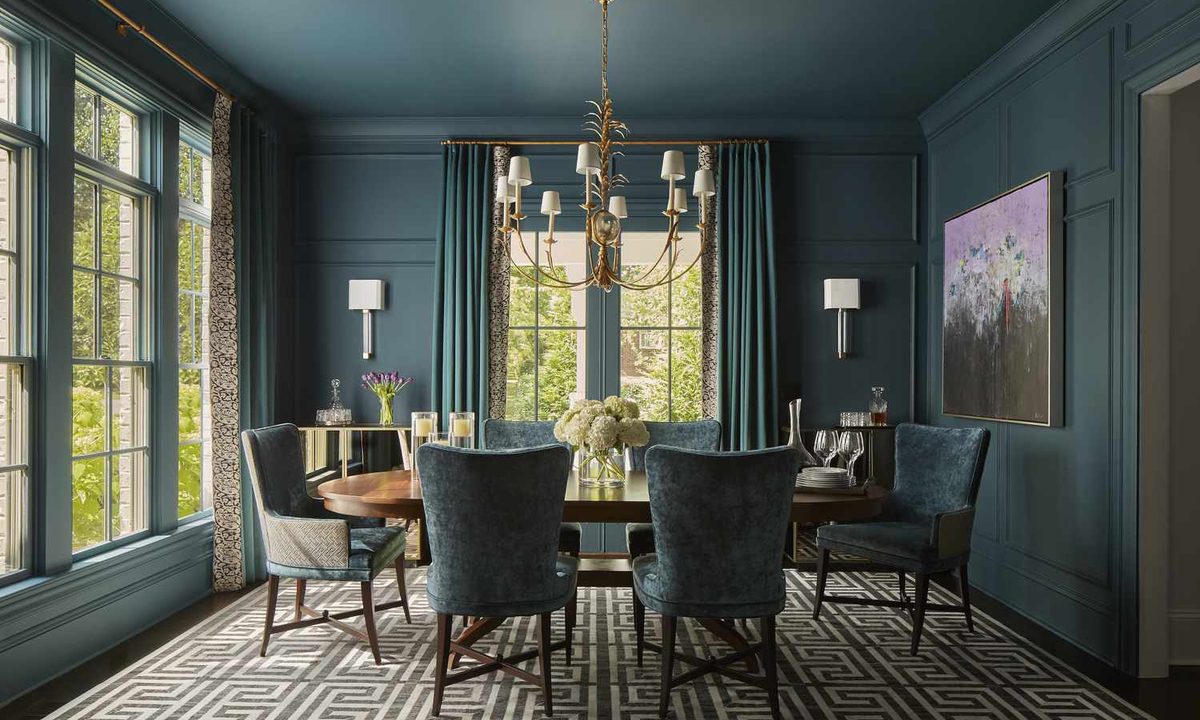 Caption: “Elegant navy dining room where walls, ceiling and trim are painted the same shade — a bold take on color drenching.” Credit: “Photo credit: Zeke Ruelas / Brad Ramsey Interiors / Martha Stewart” Suggested file name: hero-color-drenching-navy.jpg