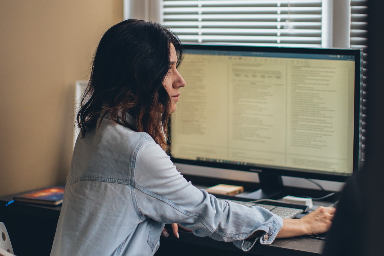 Woman working from home at desk