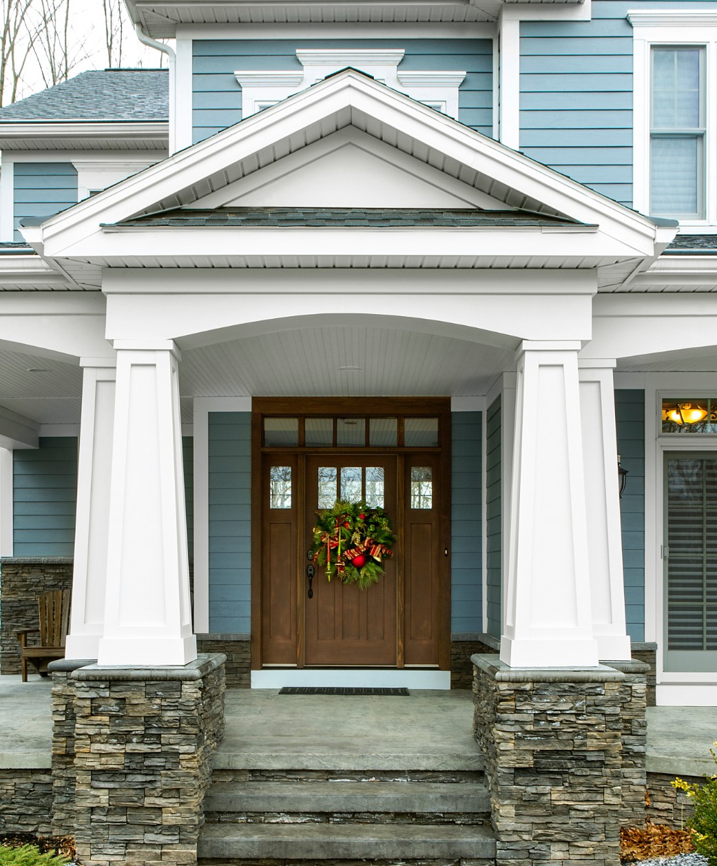 Large blue house with porch