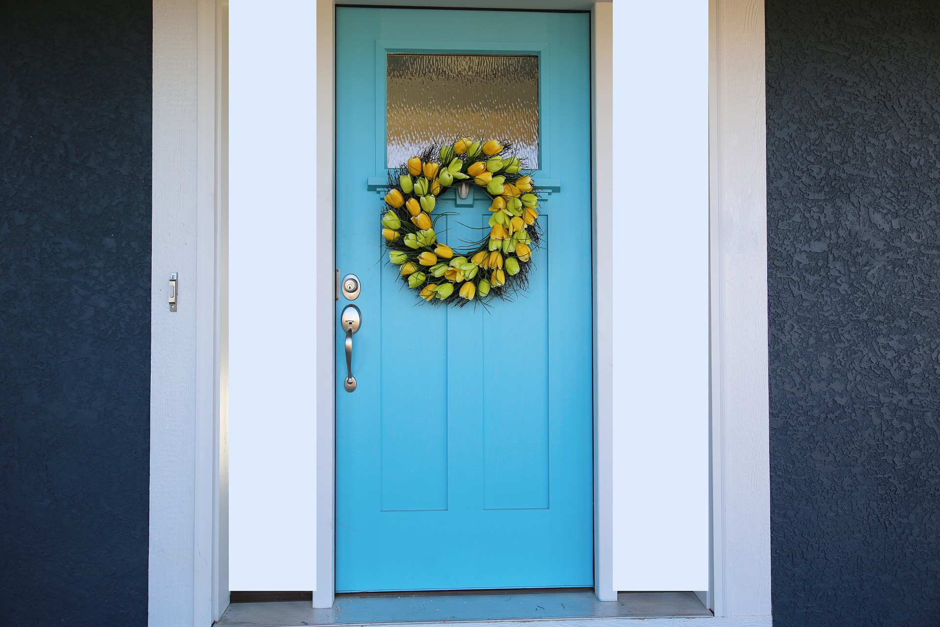 Blue door with yellow wreath