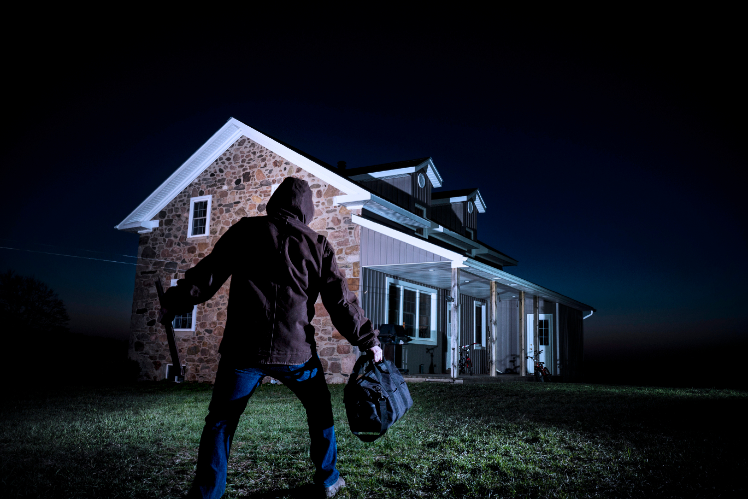 burglar outside of house at night
