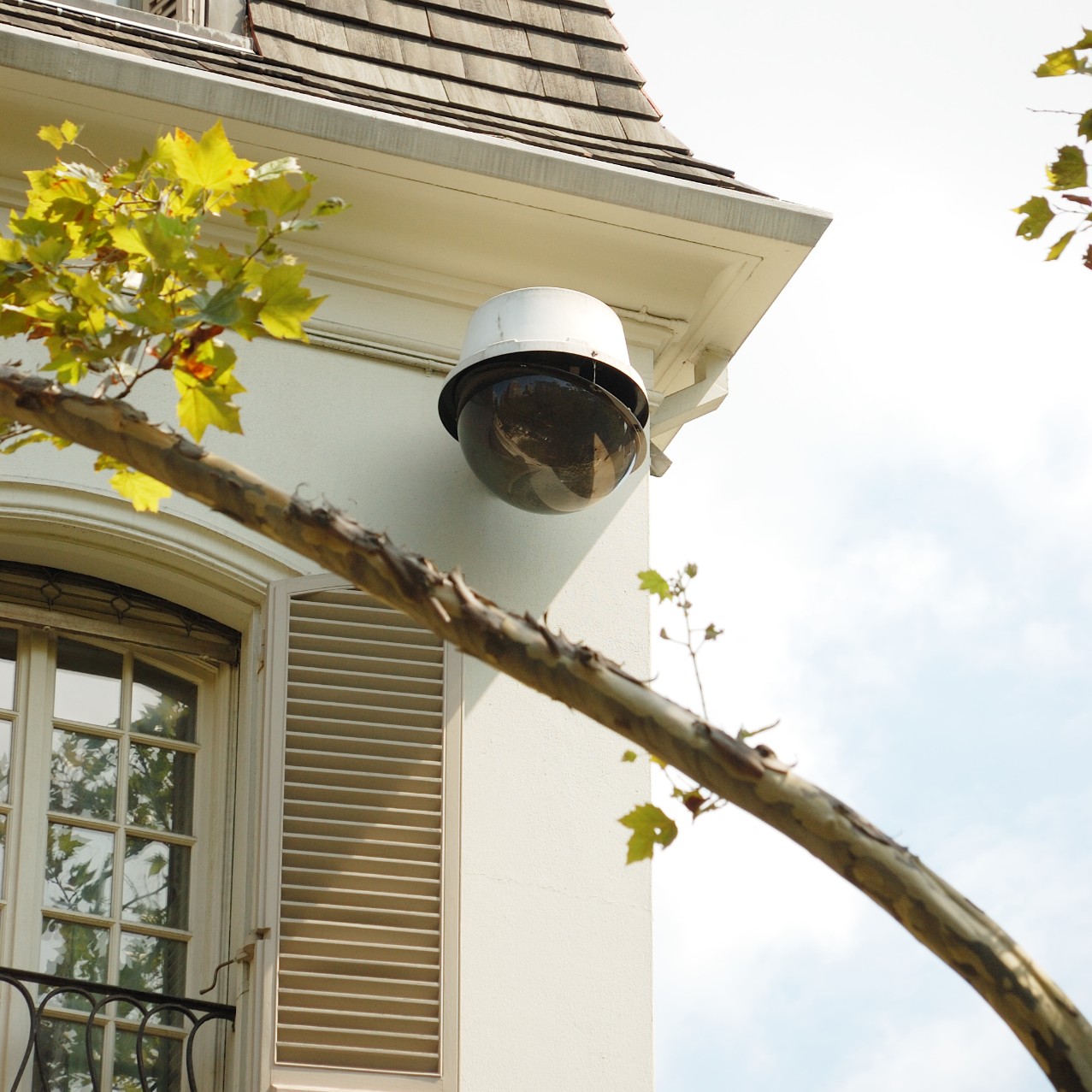 Security camera attached to home