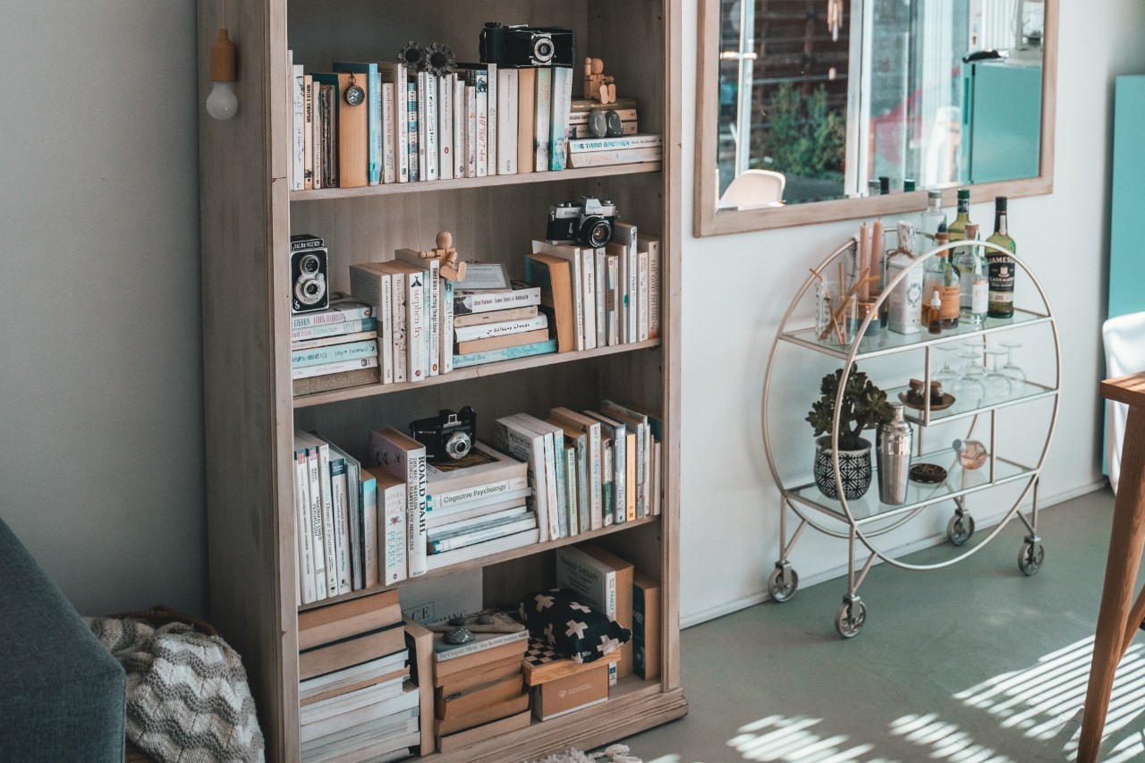 Bookshelf filled with books and decorations