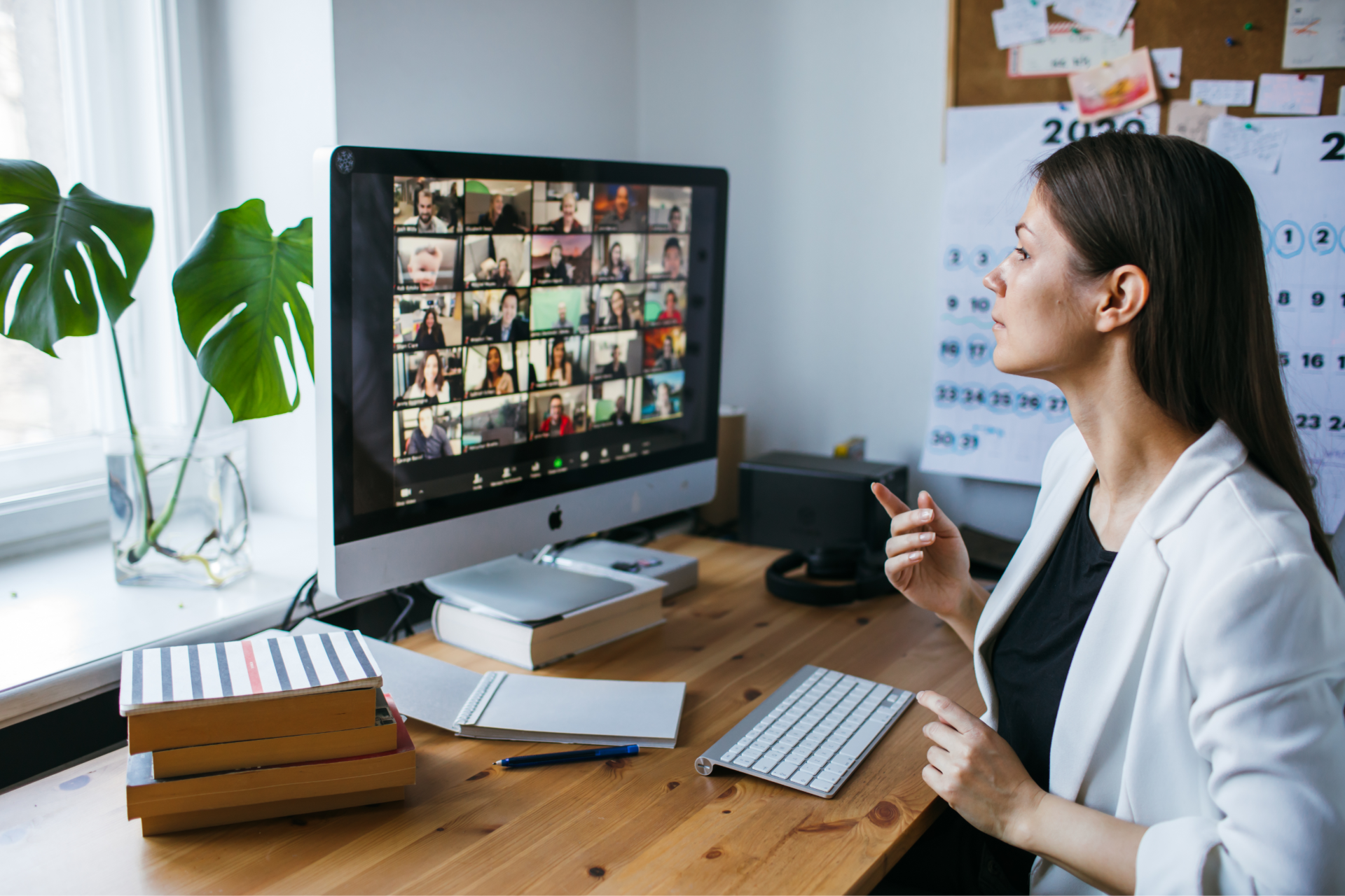 Woman at teleconference working at home