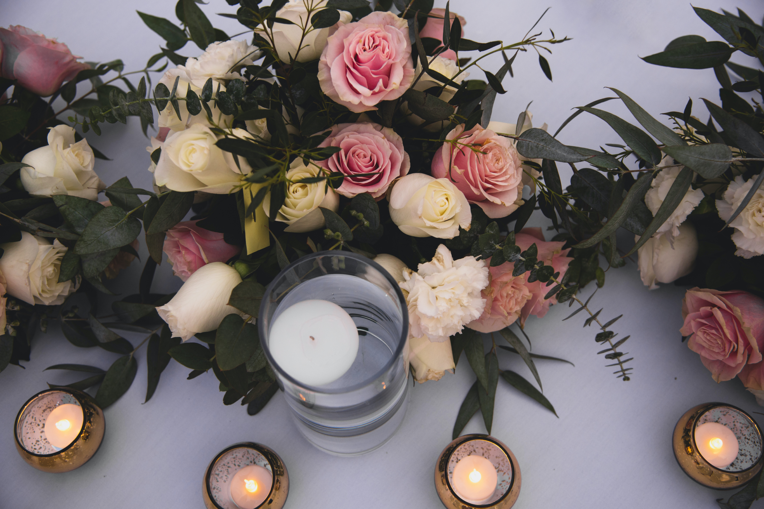 floral and votives centerpiece