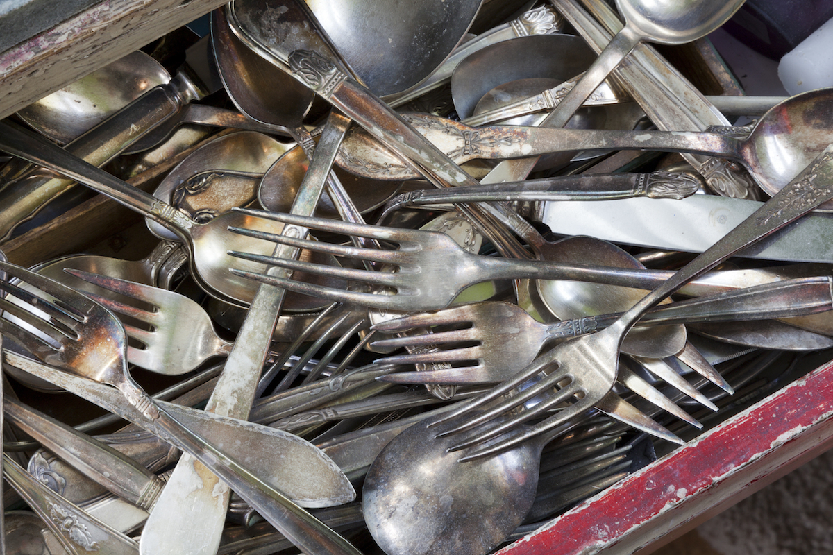A messy utensil drawer