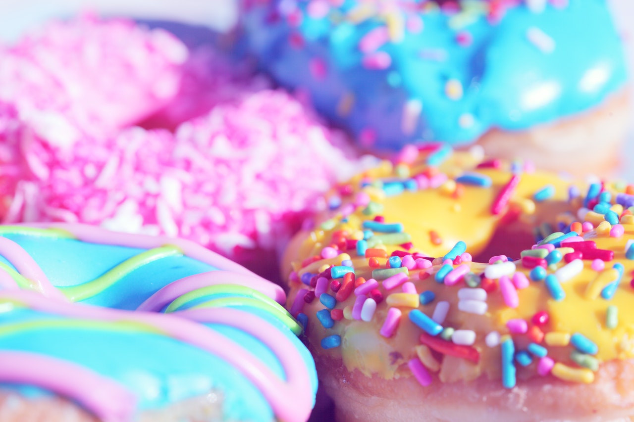 Frosted doughnuts with sprinkles