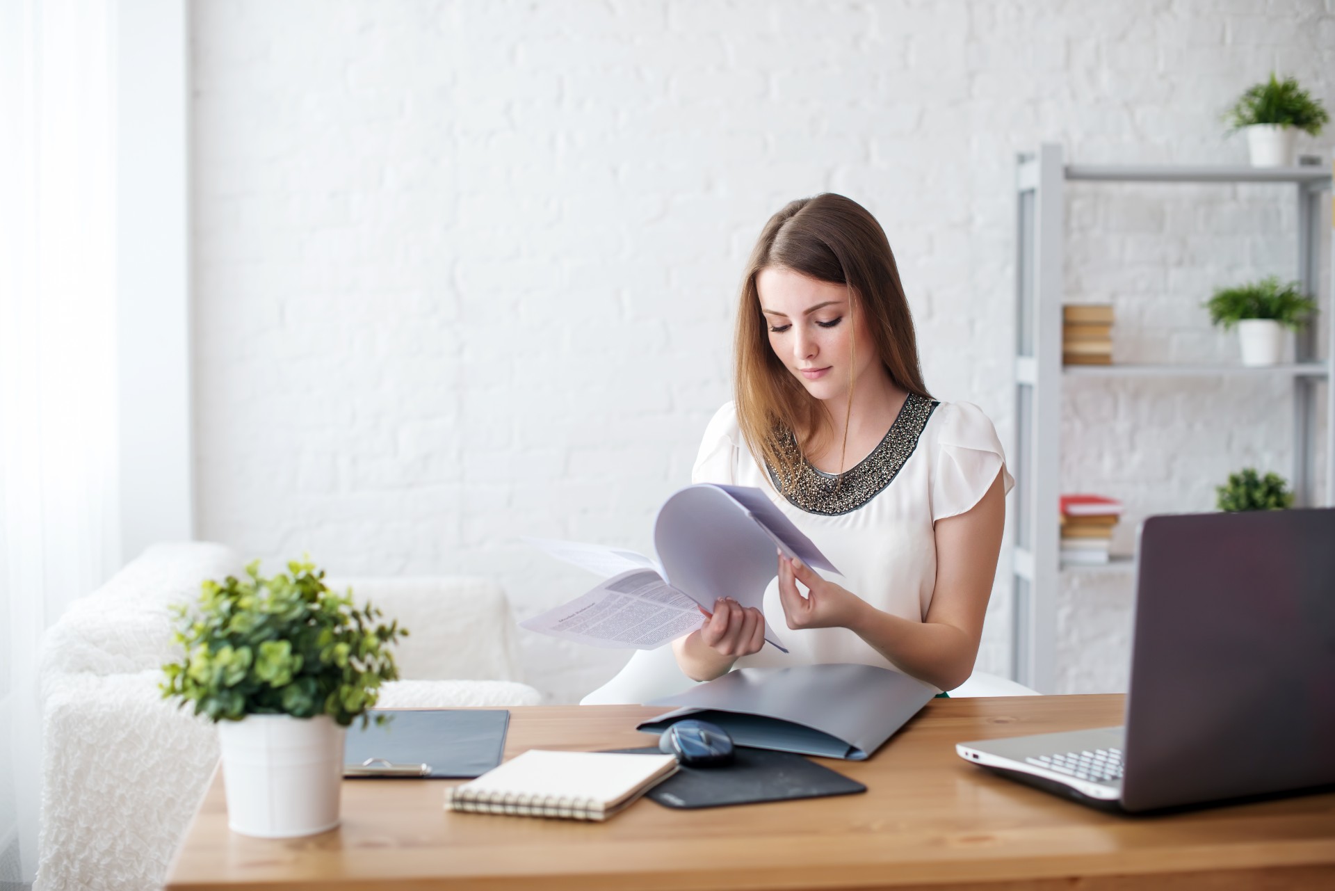 woman sorting paperwork