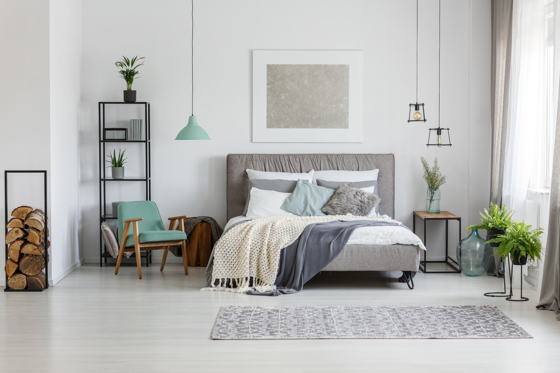 neutral bedroom with pop of blue