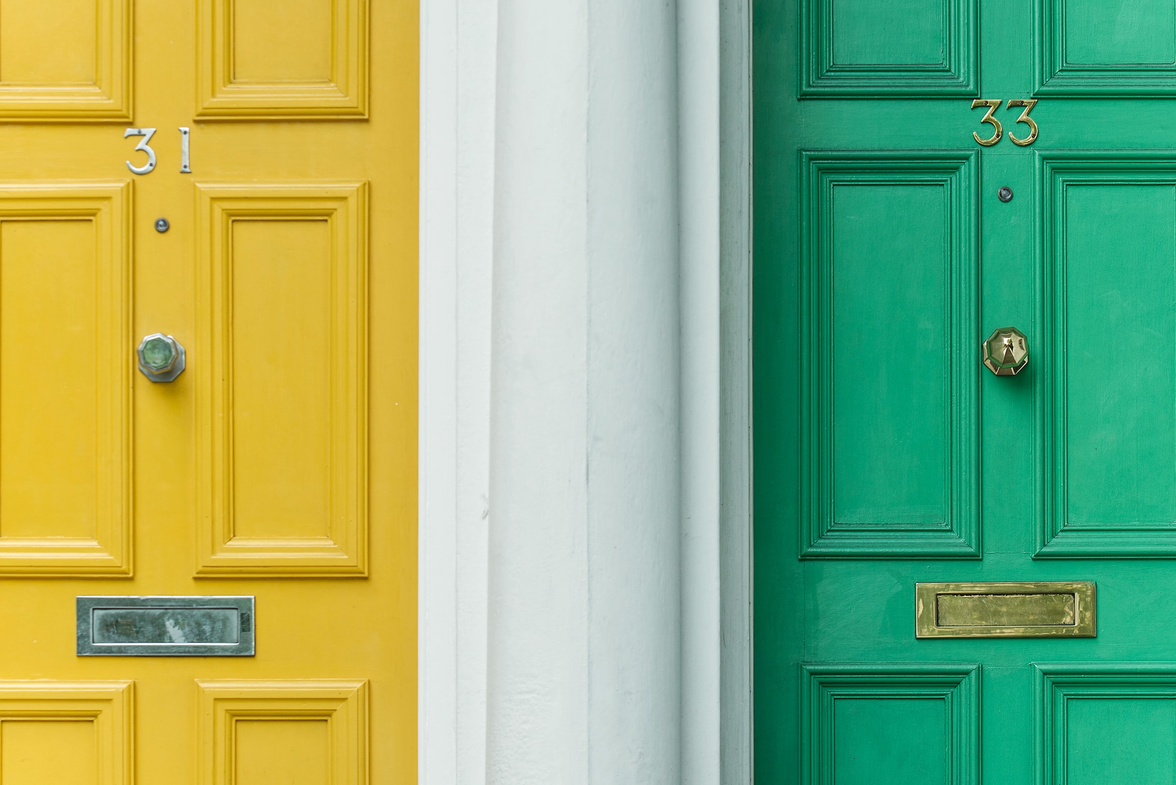 green and yellow exterior door types next to each other