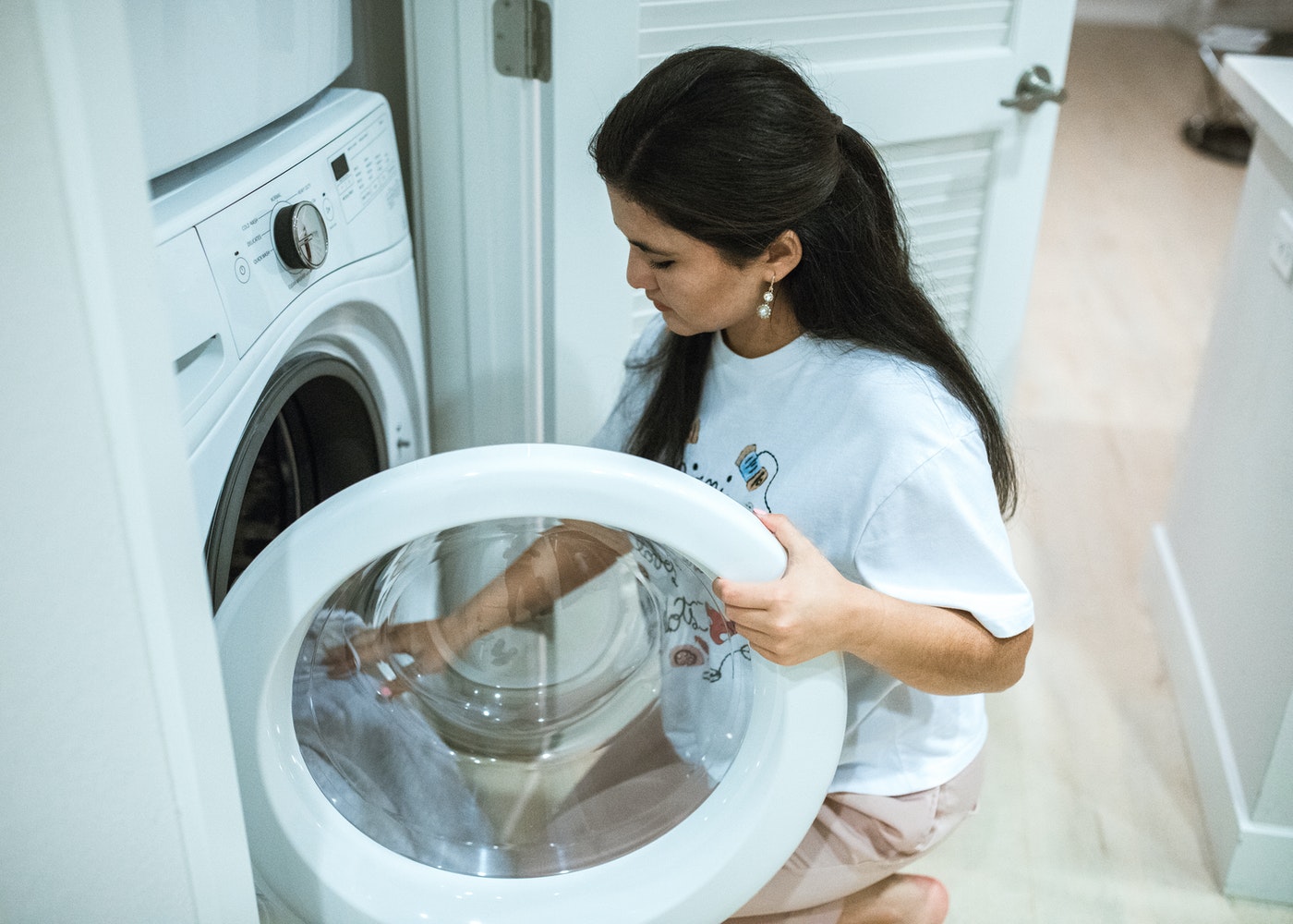 A woman doing the laundry.
