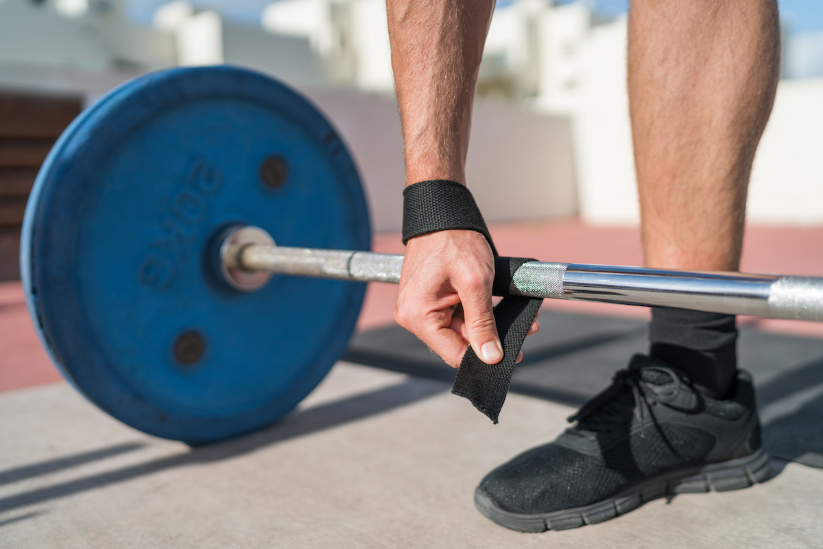Close-up of hand on a weightlifting bar