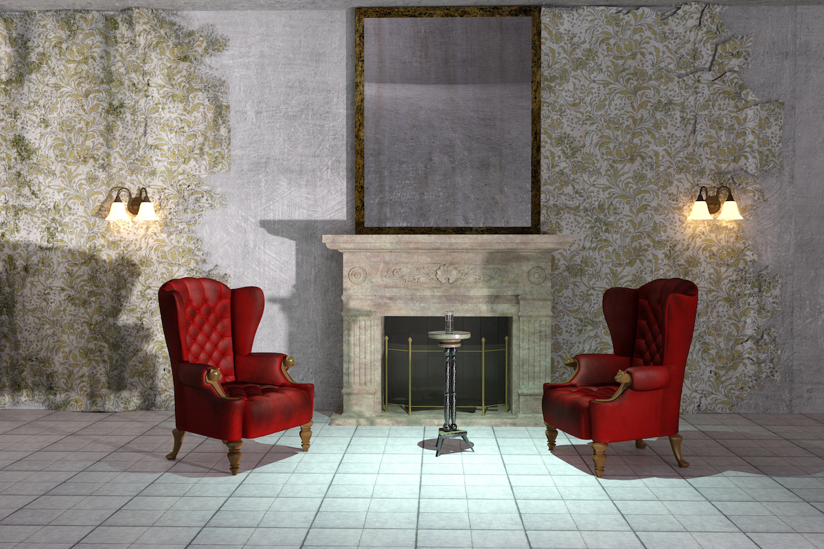 wingback chair next to fireplace