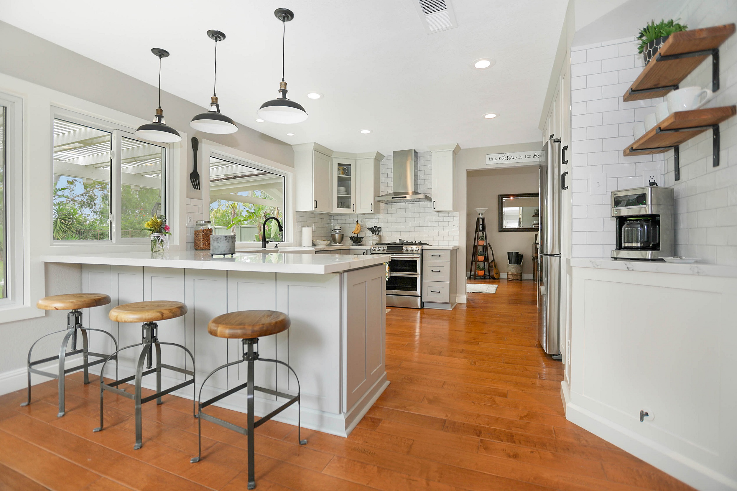 modern farmhouse kitchen with bright hardwood floors