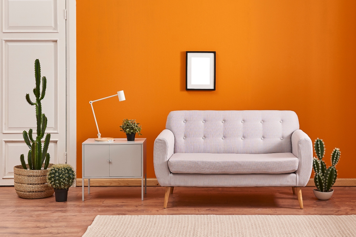 orange feature wall in living room