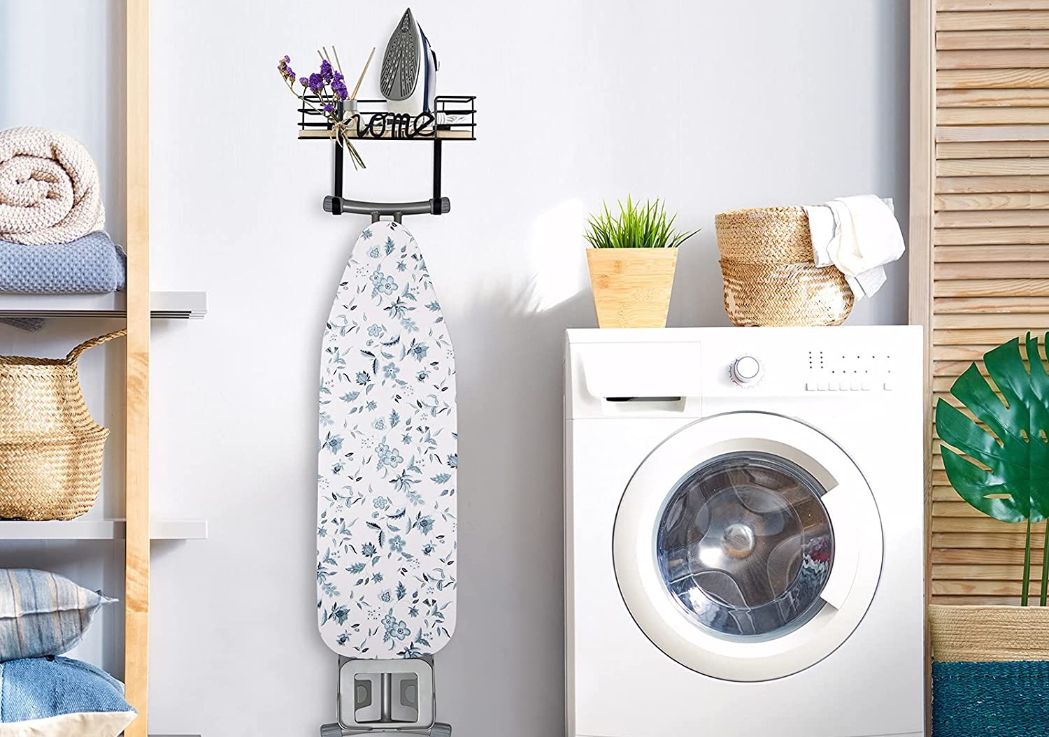 wall mounted ironing board in small laundry room