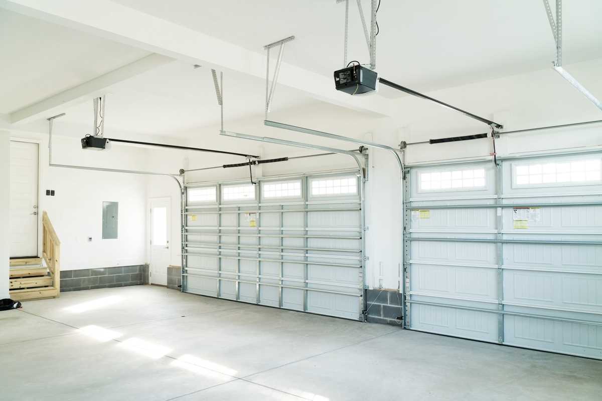 Interior shot of two white garage doors