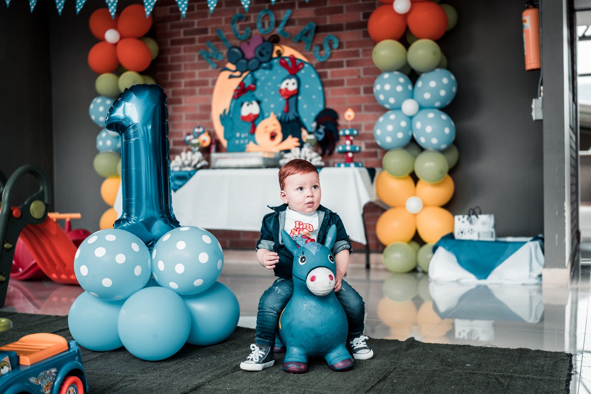child with party decorations