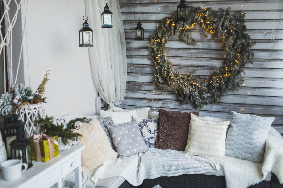 a cozy balcony decorated for winter