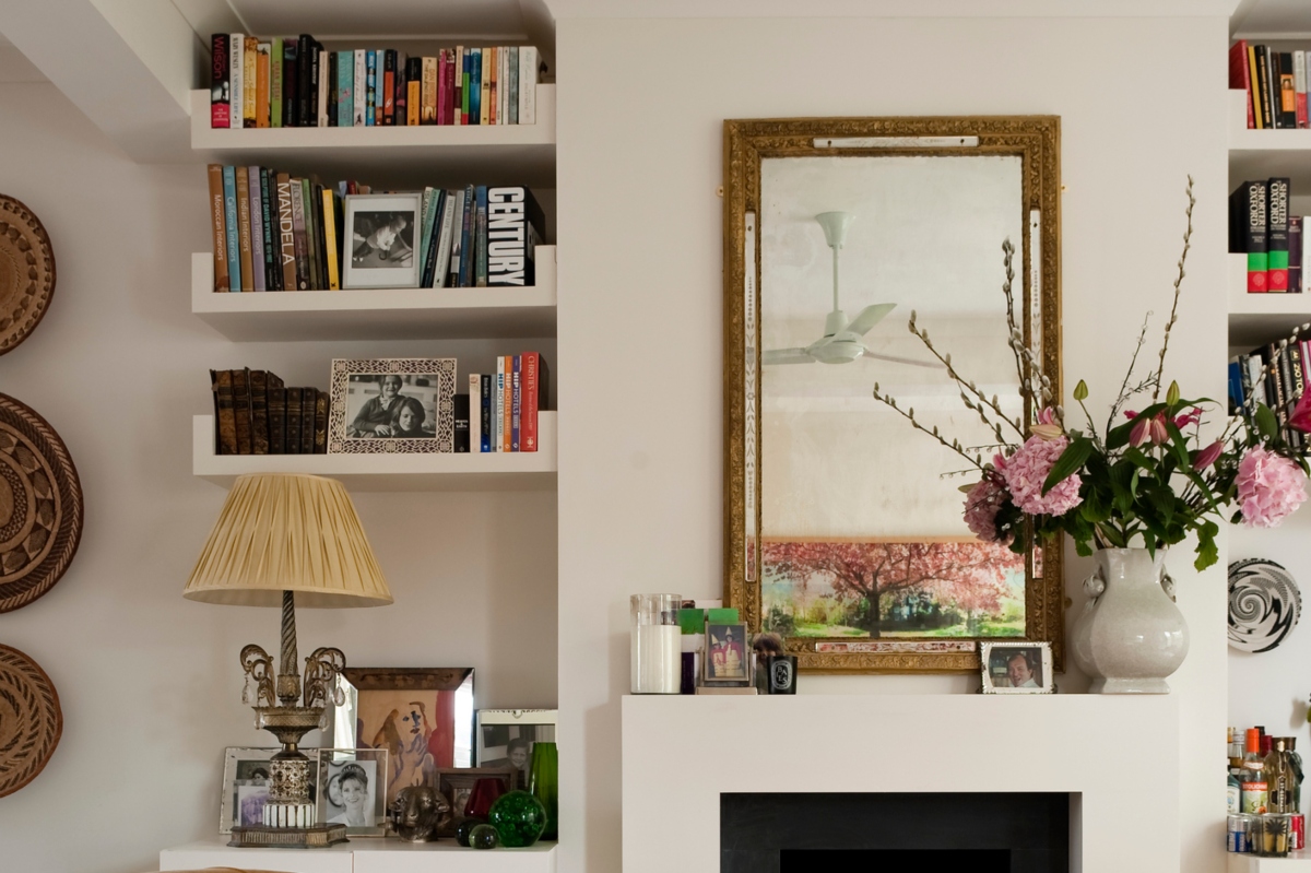 mirror and flowers on mantel for vintage design