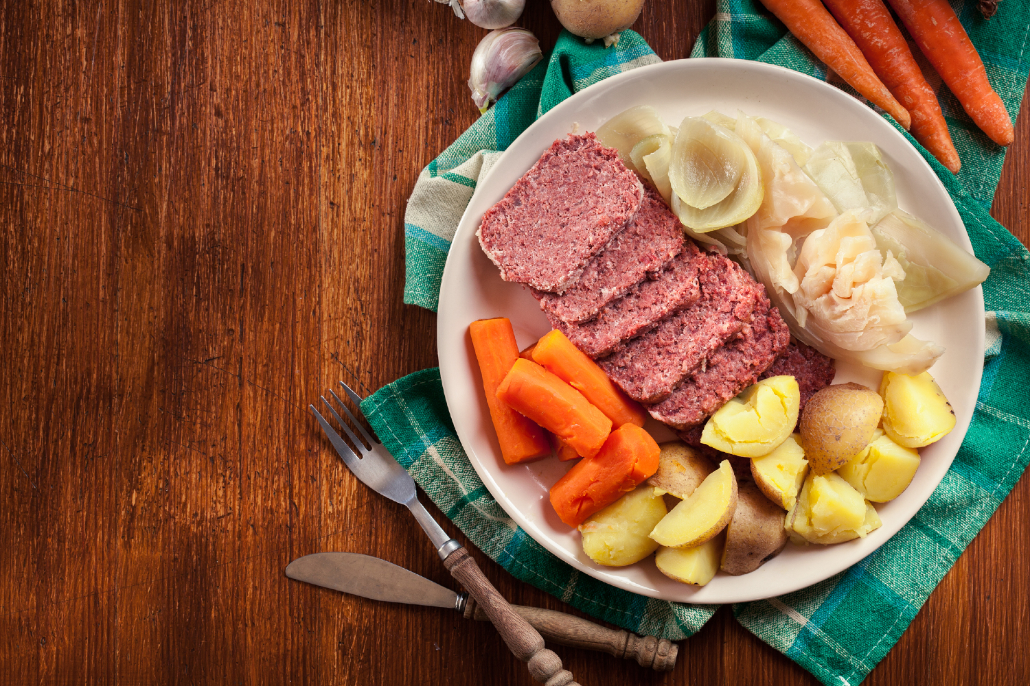 Plate of corned beef and cabbage on a table