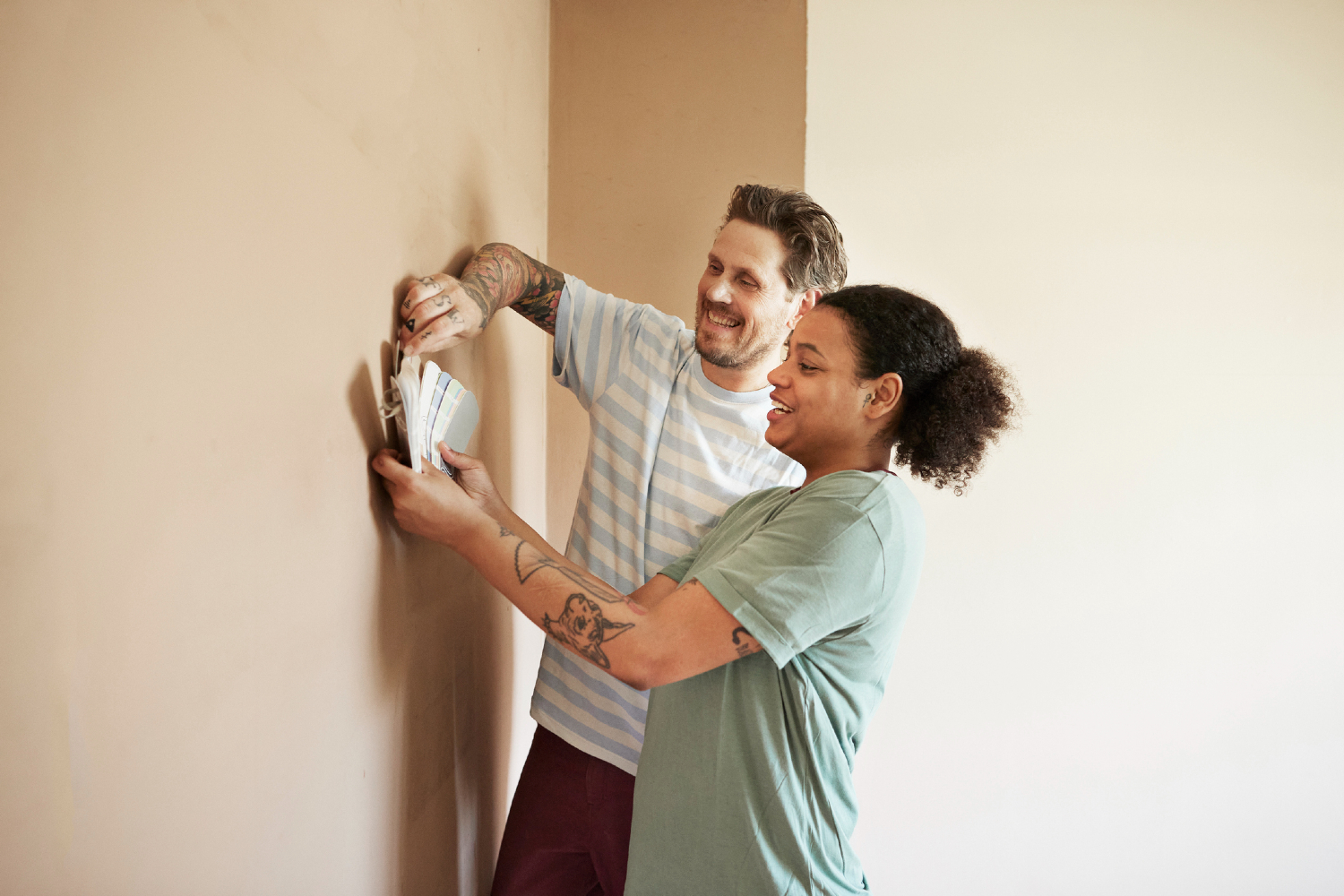 Couple picking paint colors.