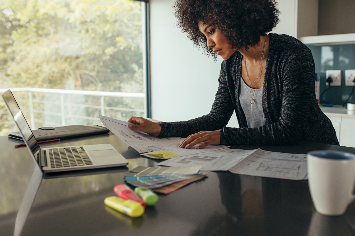 Woman sitting at desk in a work from home office