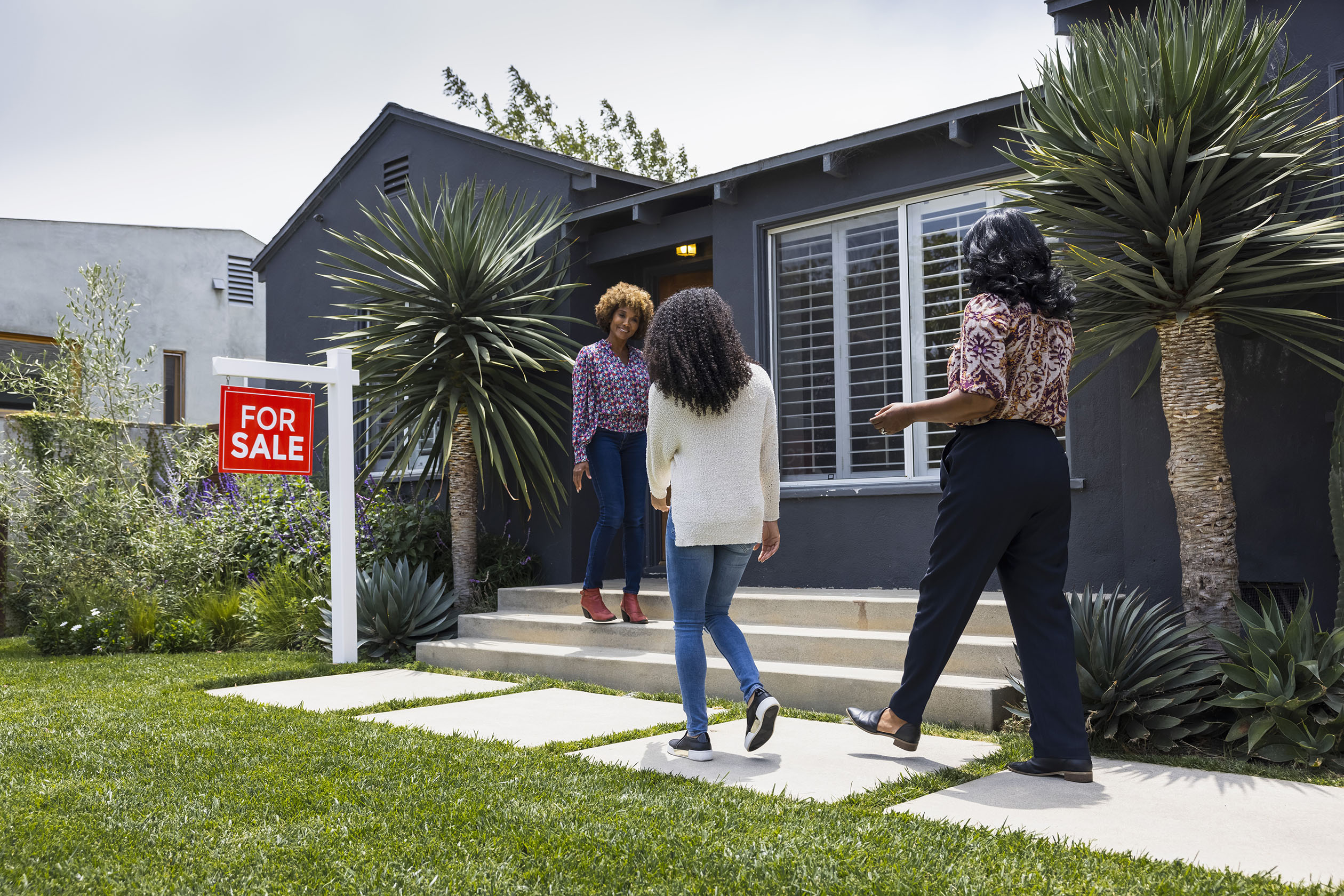 Women viewing a house that's for sale