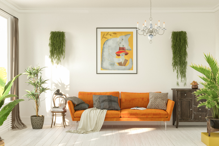 Orange couch in retro midcentury modern living room design