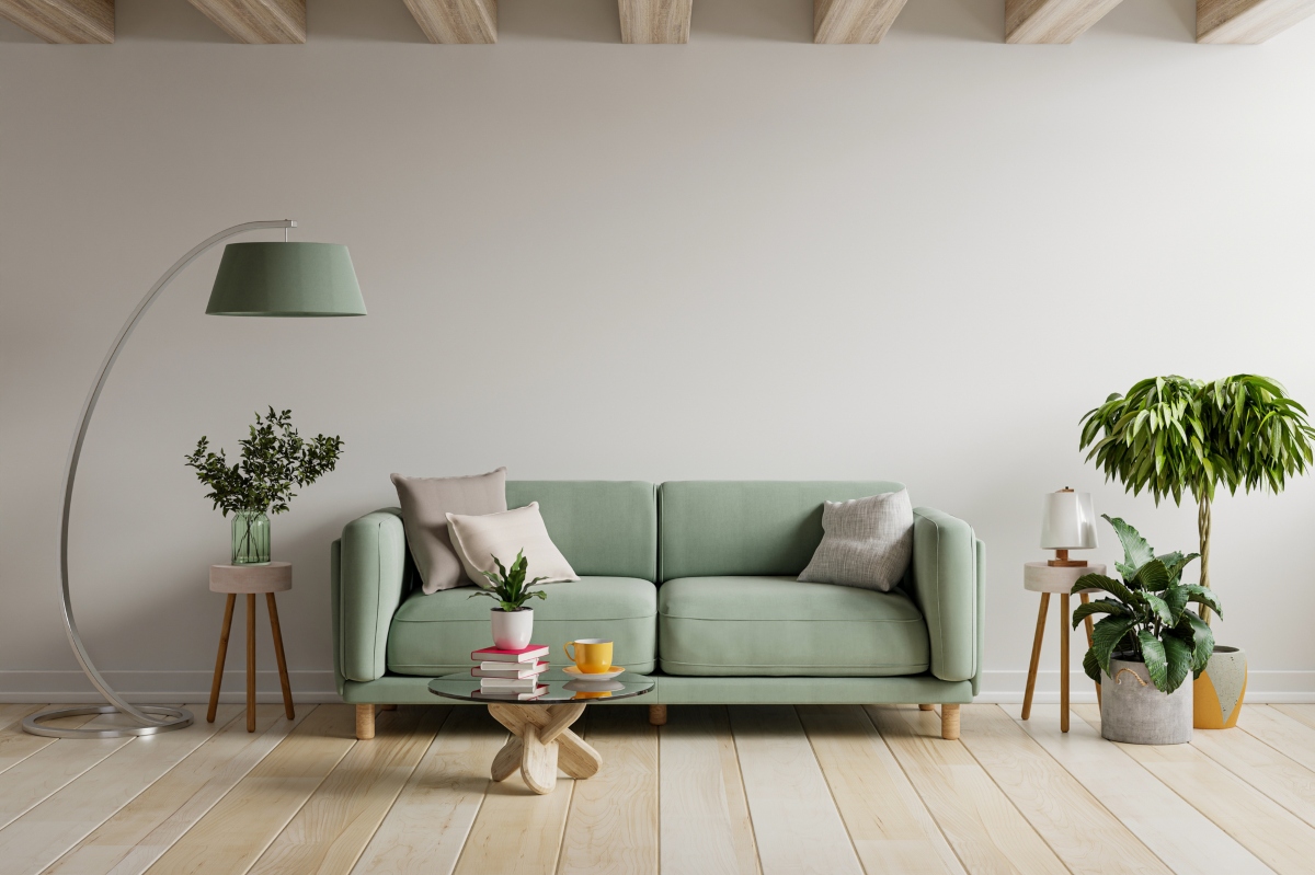 Small living room design with pastel green sofa