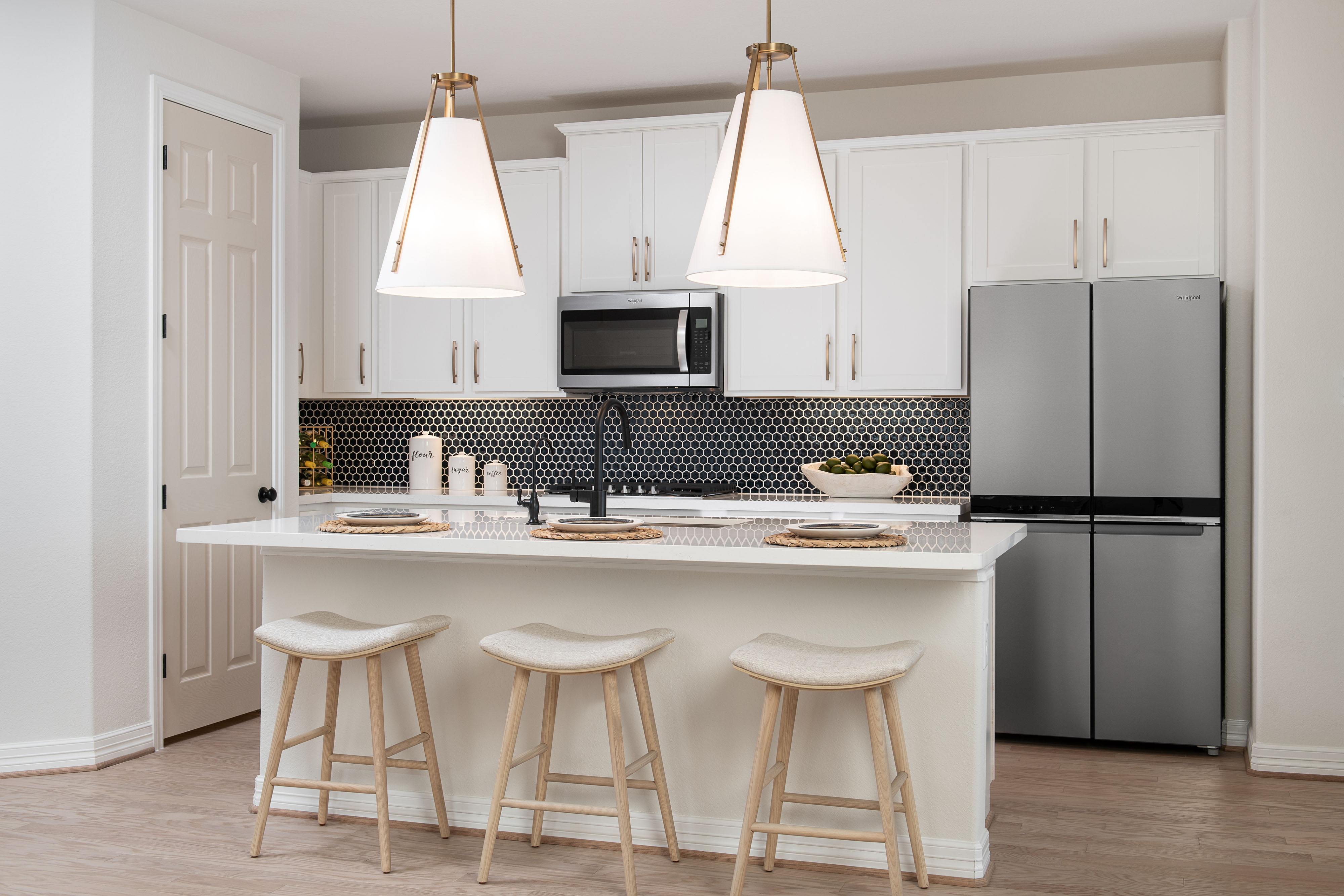 Updated kitchen with tile backsplash