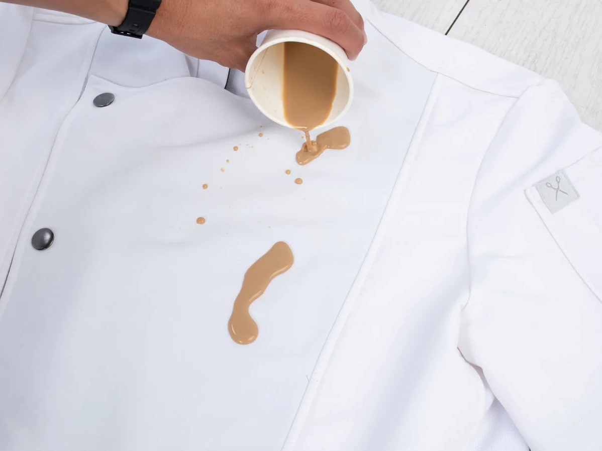 Water-repellent version of a Helt Studio apron with coffee spilled on it