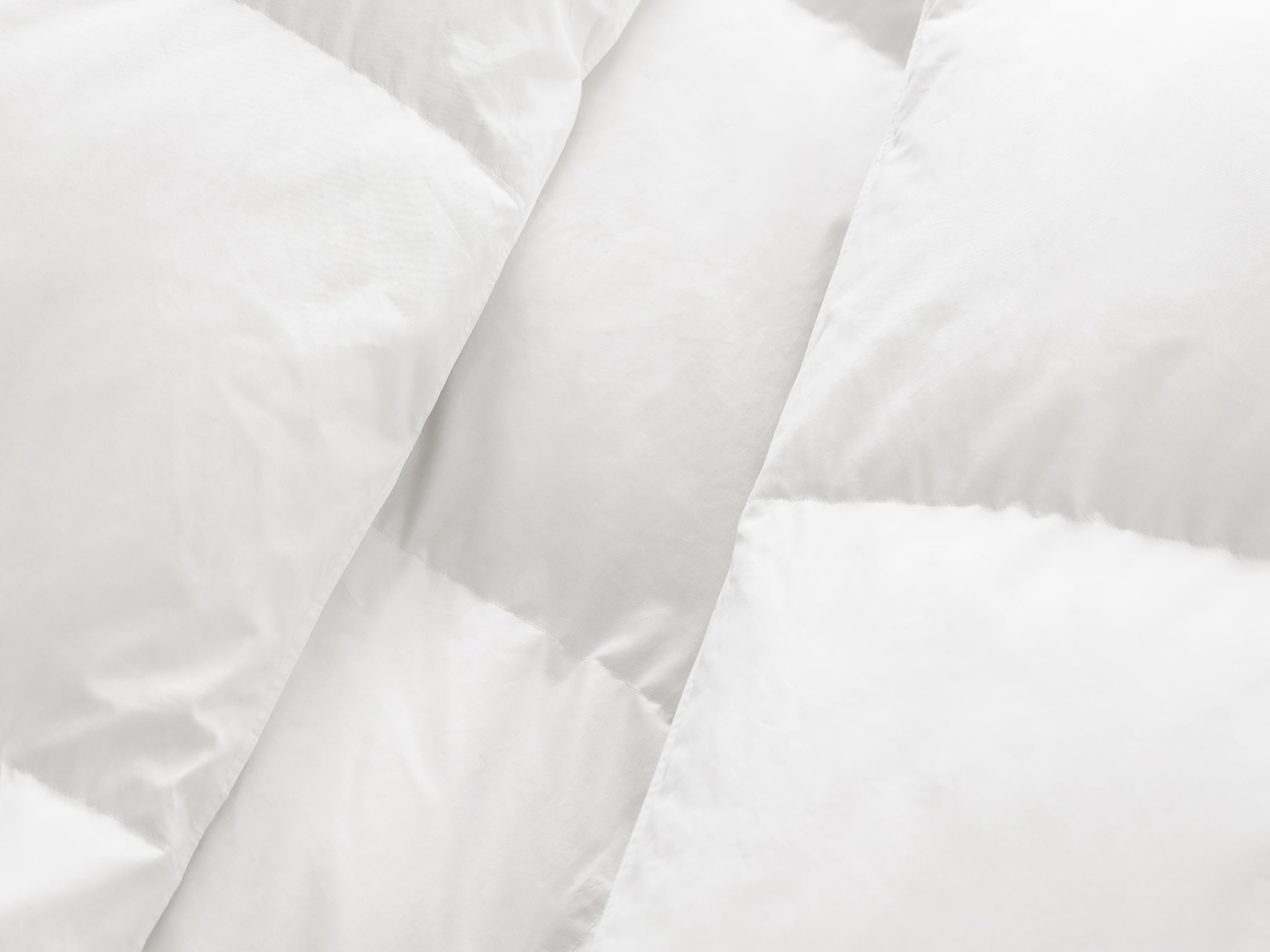 Canadian Down mattress topper close up and warm.