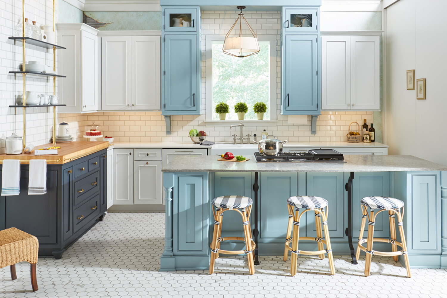 Kitchen with light blue cabinets and wood accents