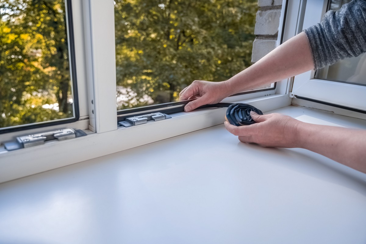 Insulating windows from the inside with weatherstripping