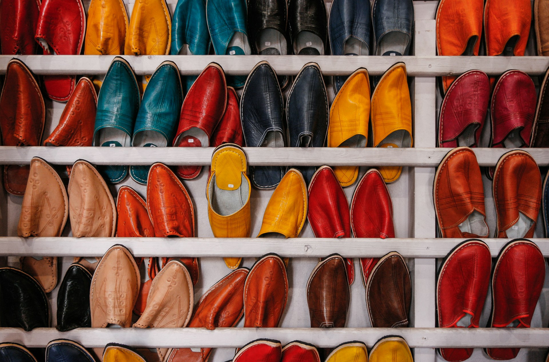 Shoes in a large shoe storage rack