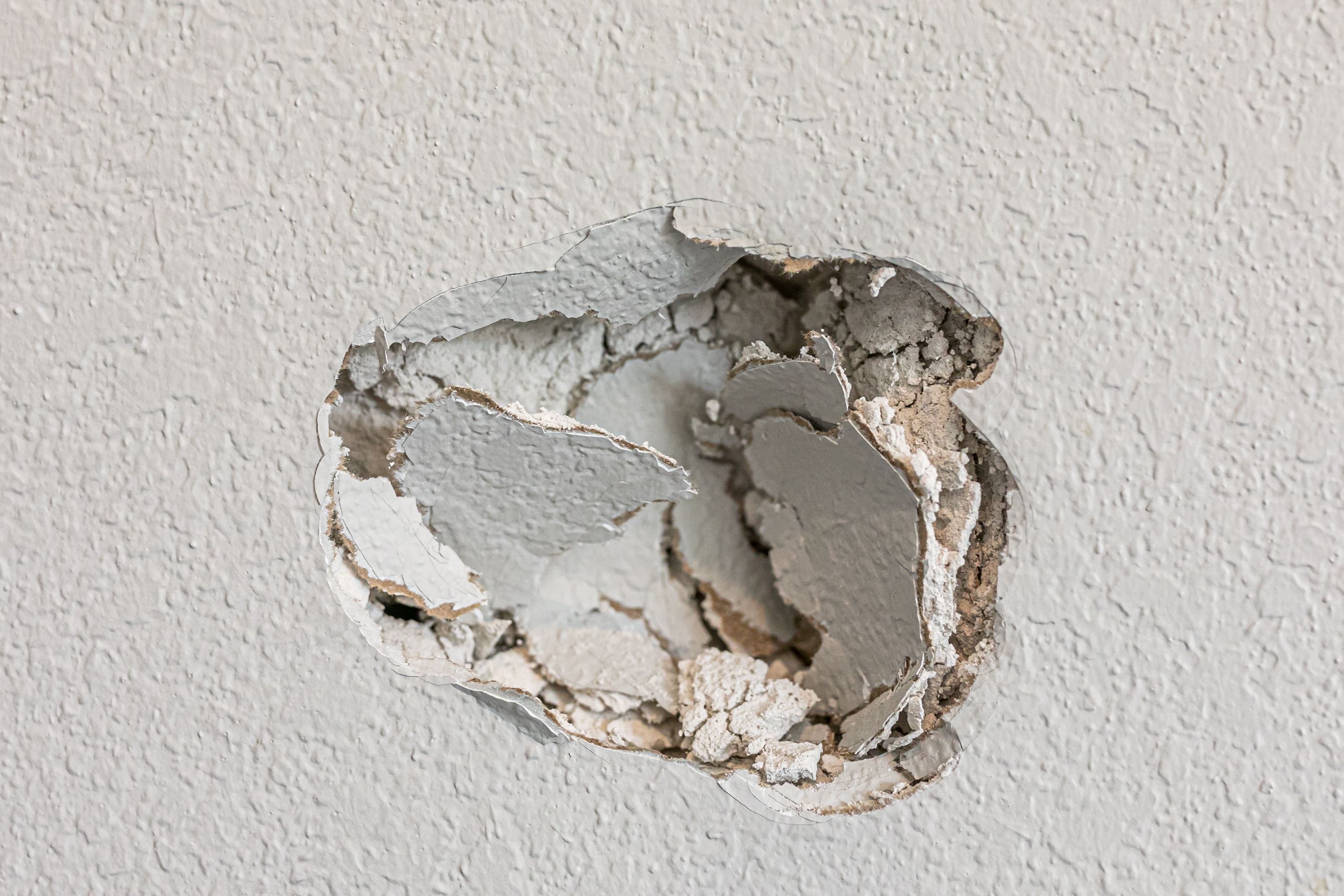 Hole in drywall surface. How to repair drywall fast