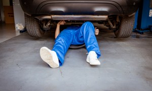 best garage floor mats auto mechanic working on a car engine in repair shop