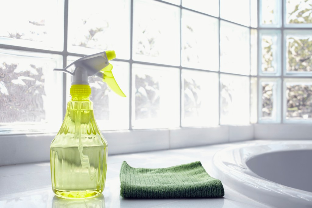 cleaning solution and cloth on coutnertop