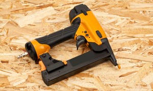 the best short extension cords for your home nail gun on a wood background