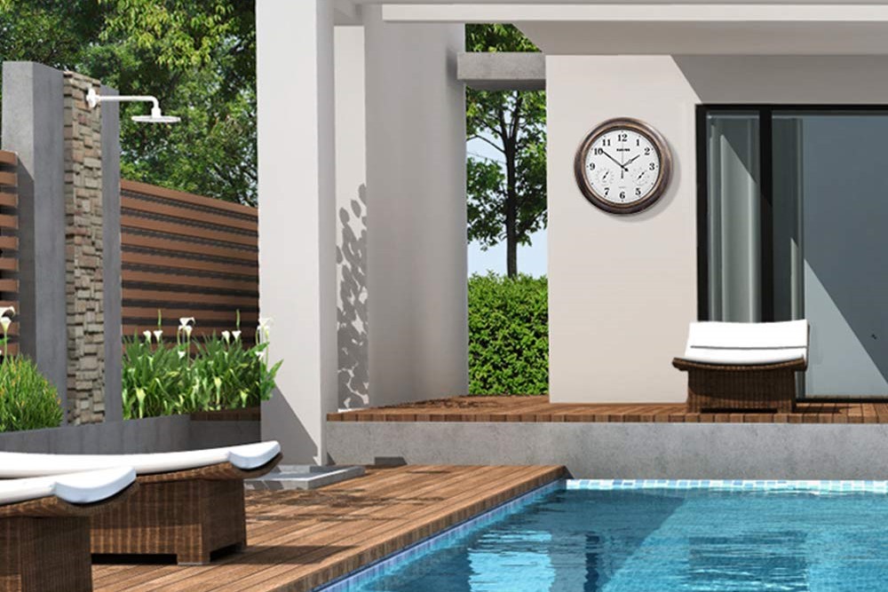 Outdoor clock near a pool