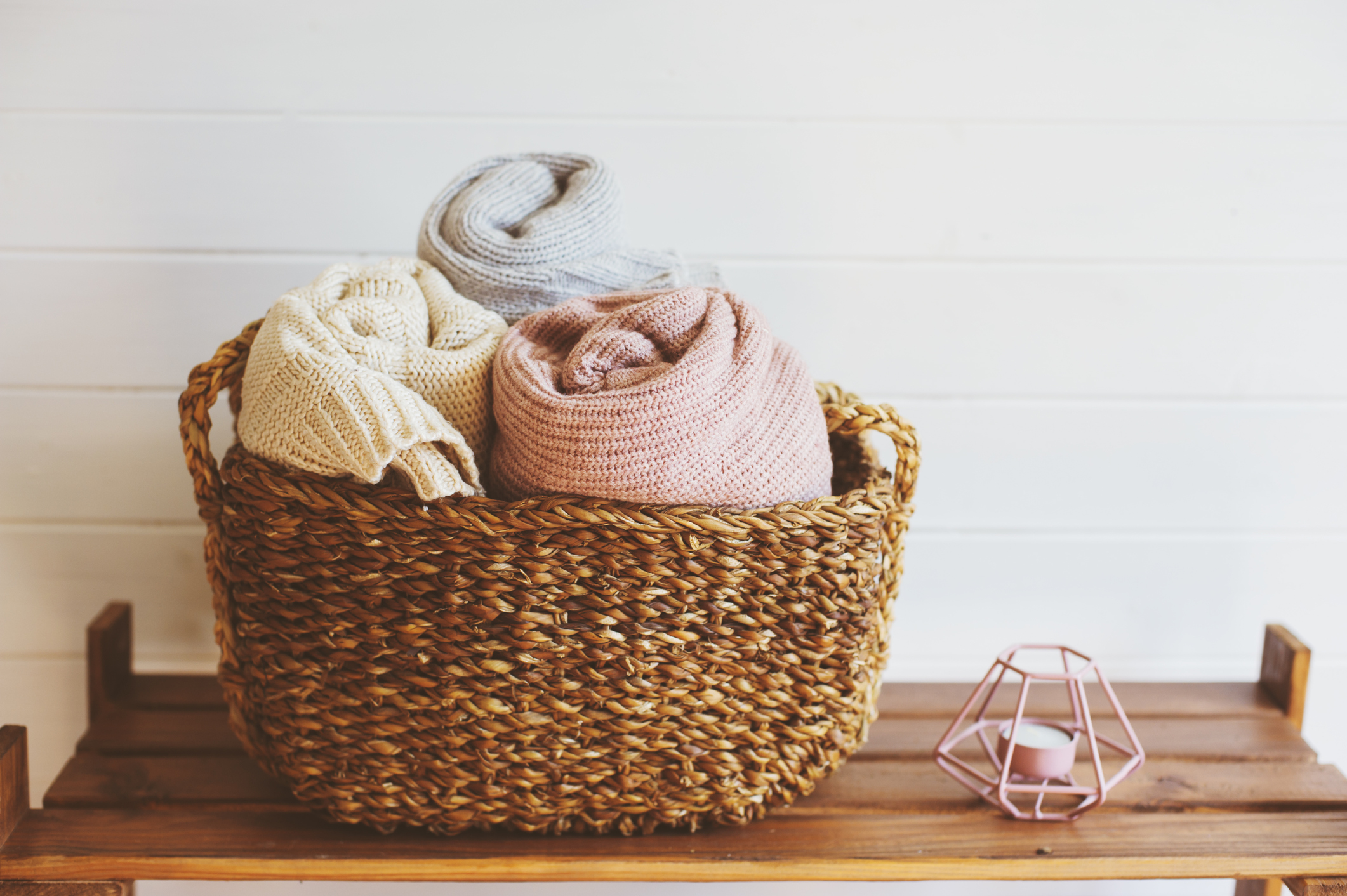 Cozy blankets in a wicker basket