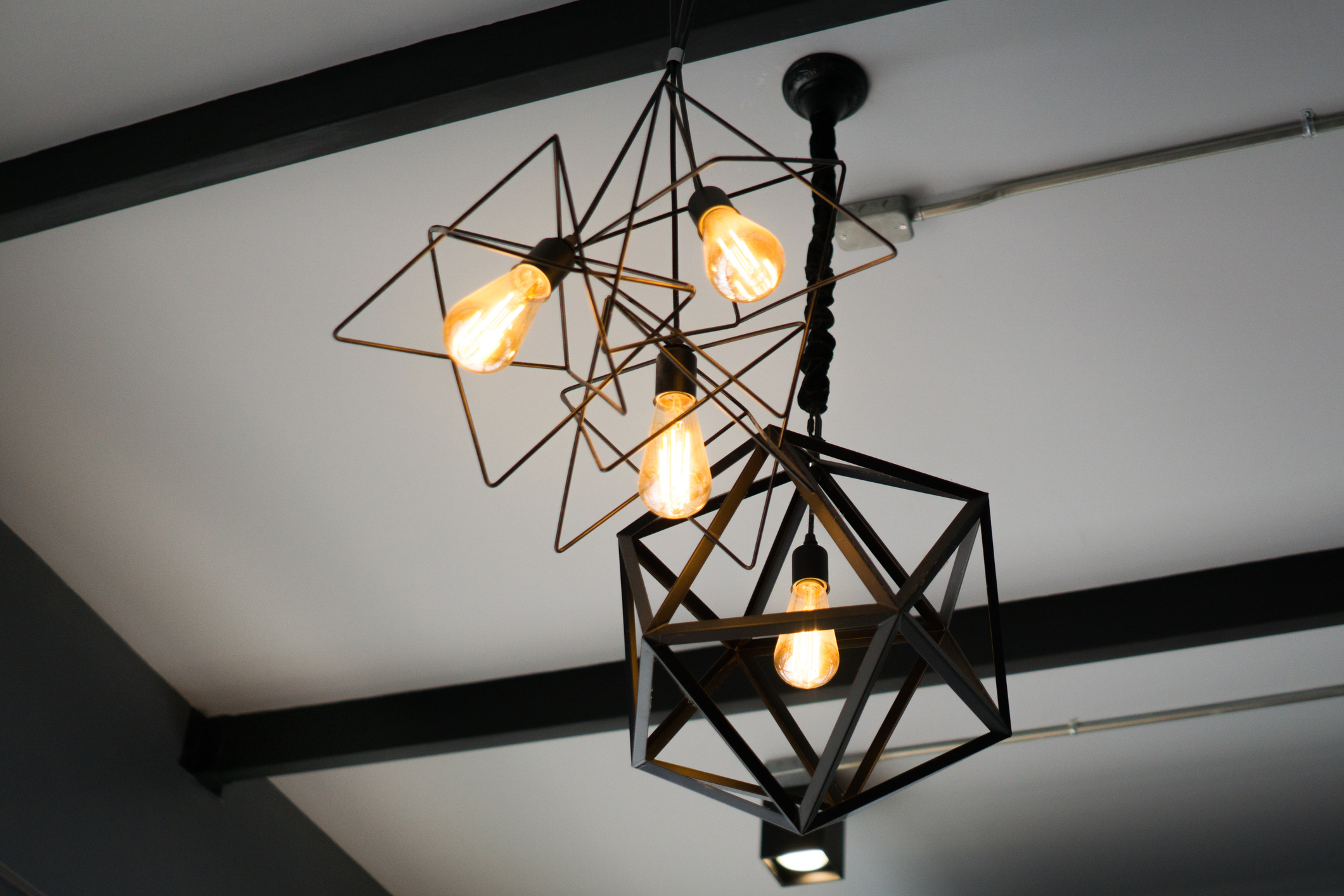 industrial pendant lights hanging from ceiling