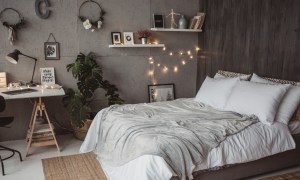 gray bedroom with fairy lights