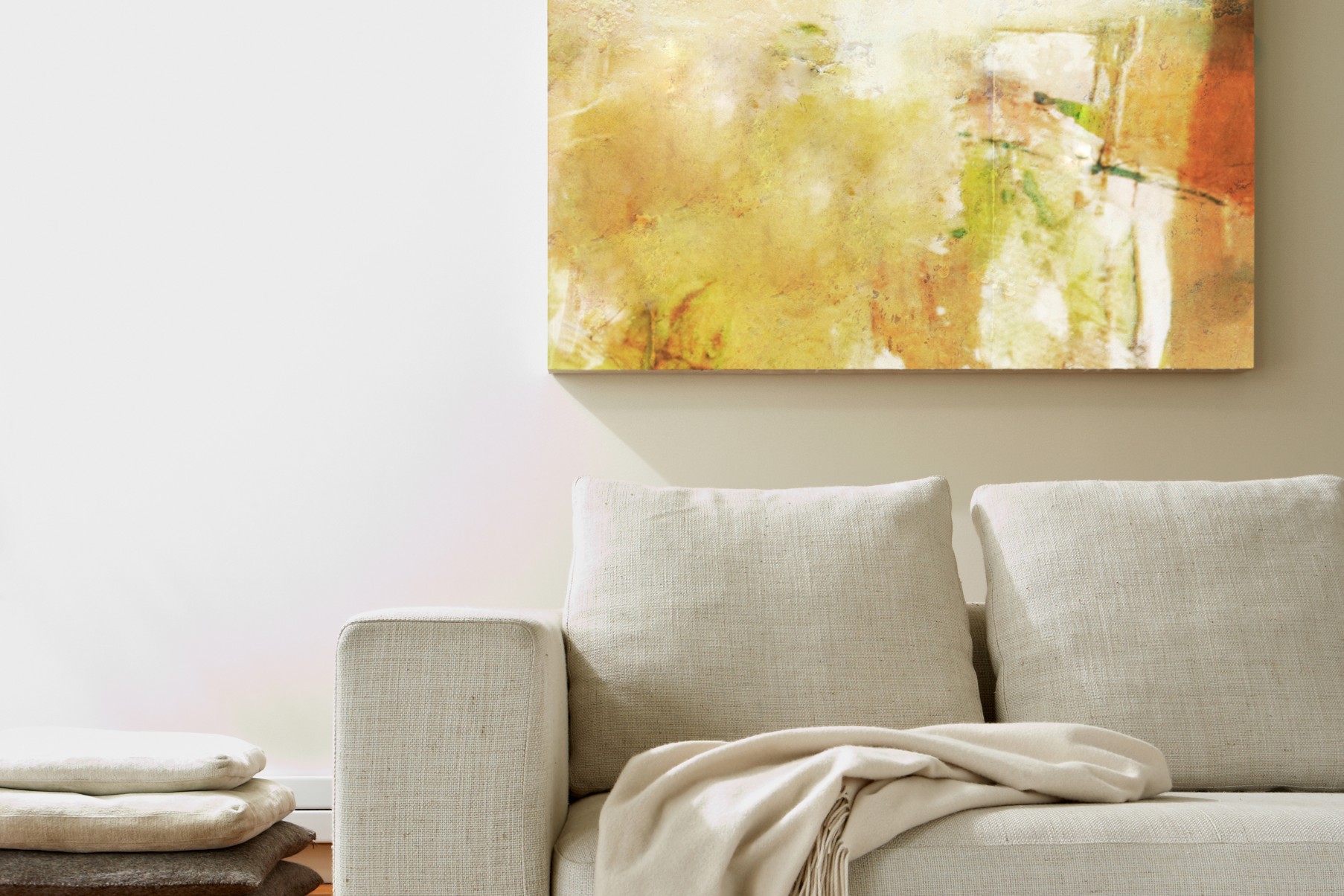 Living room with couch and artwork on the wall