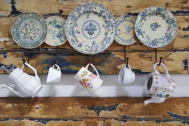 the best plate hangers cups and hanging on wooden wall in kitchen