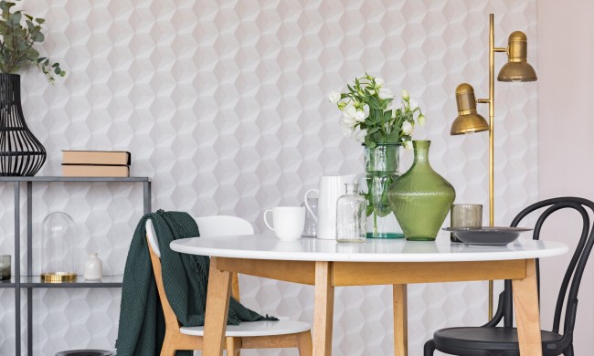 Graphic wallpaper behind small kitchen table